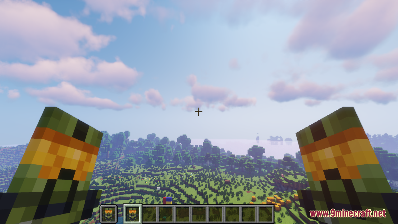 Player holding two Halo inspired totems of undying while looking at the horizon