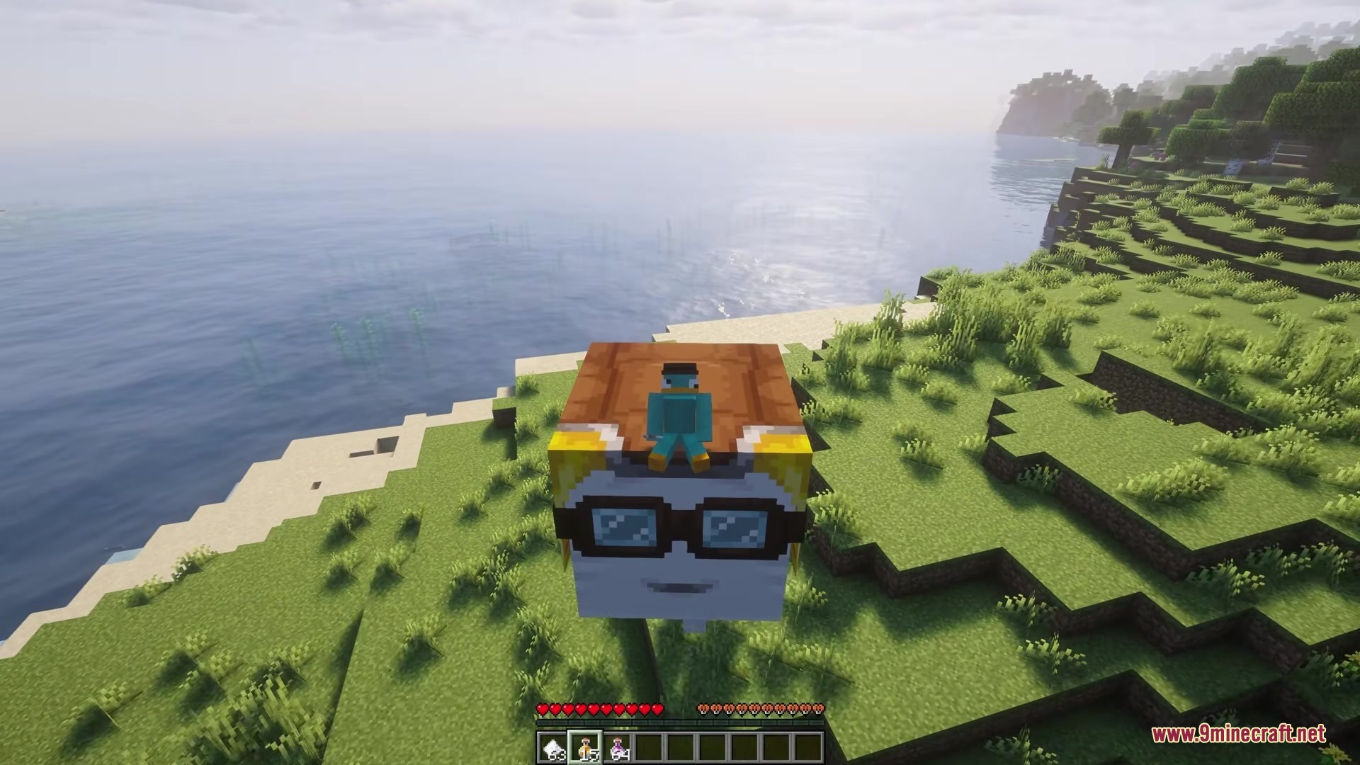 Flying a ghast from the Happy Ghast Improvements Mod over the ocean