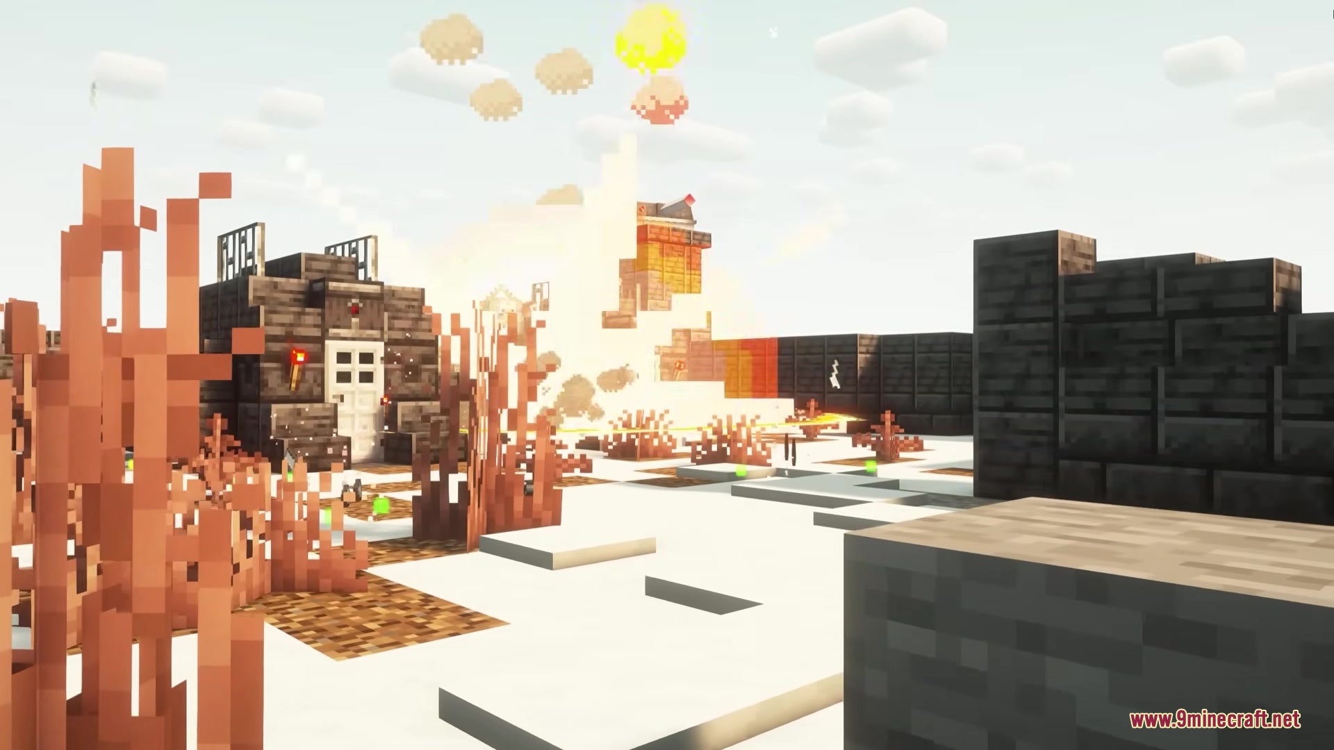 Hell Gunners Mod Screenshot 6 A bright explosion occurs near a small building in a snowy Minecraft environment