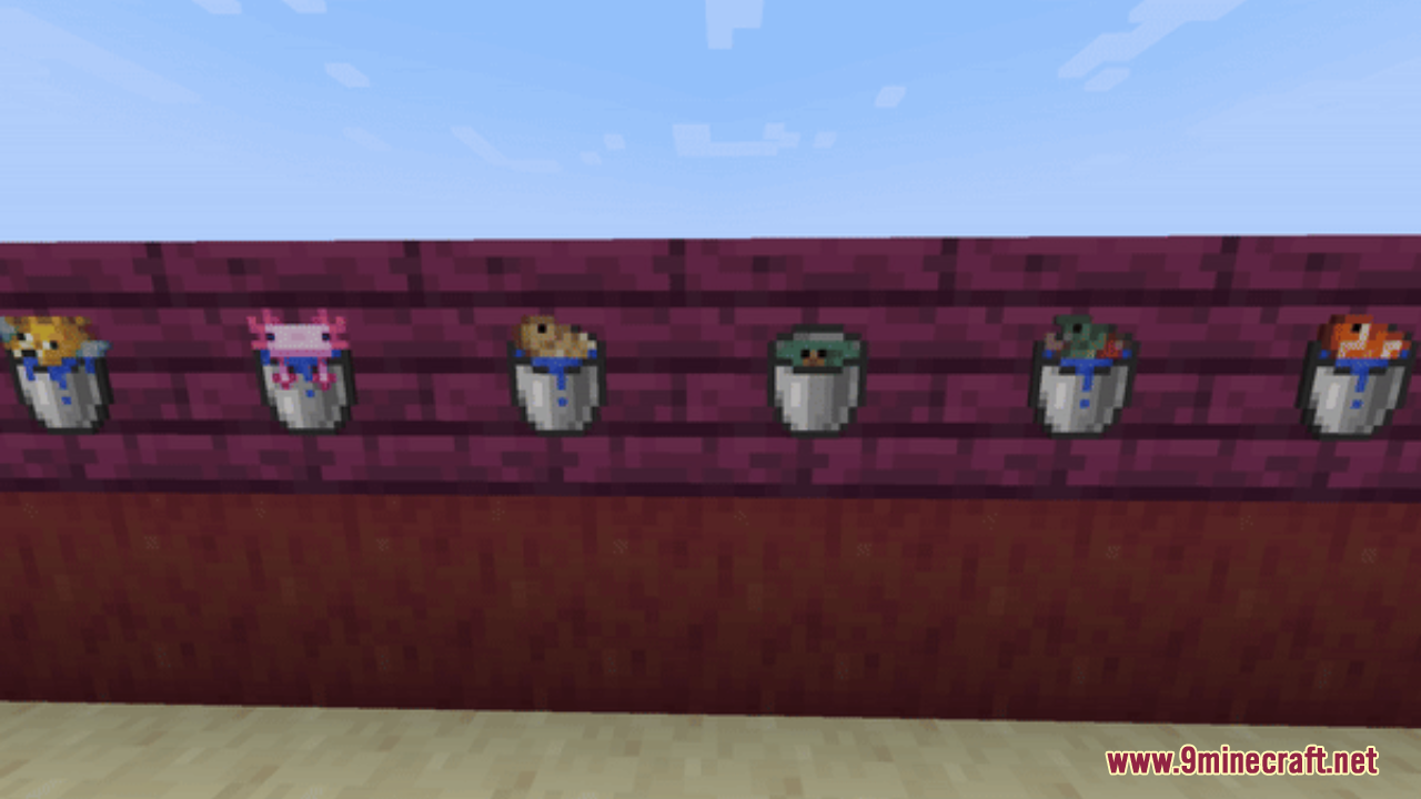 Hurkledurkle's Animated Items Resource Pack Screenshot 1 Six buckets of aquatic mobs displayed in item frames on a purple wall