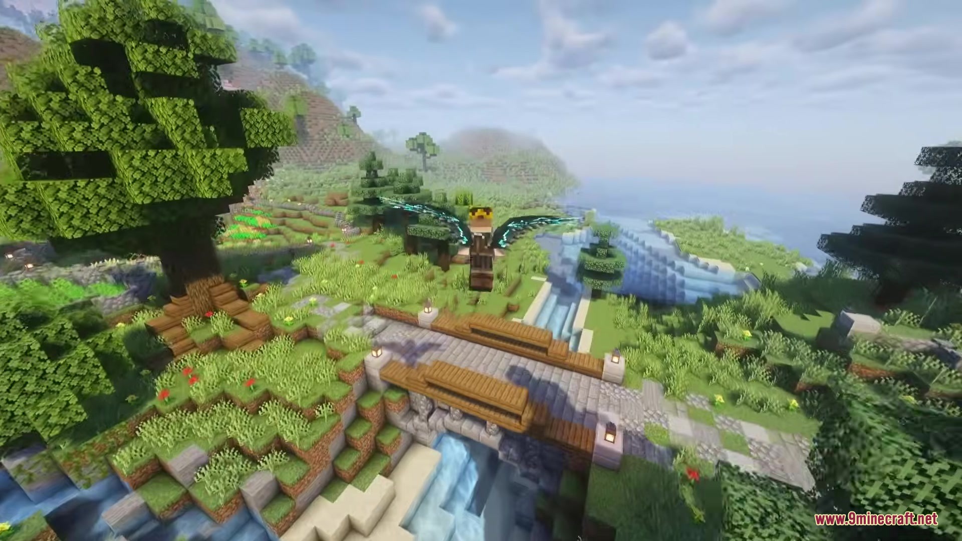 Icarus Re Winged Mod Screenshot 1 Minecraft player with glowing wings flies over a stone bridge and waterfall
