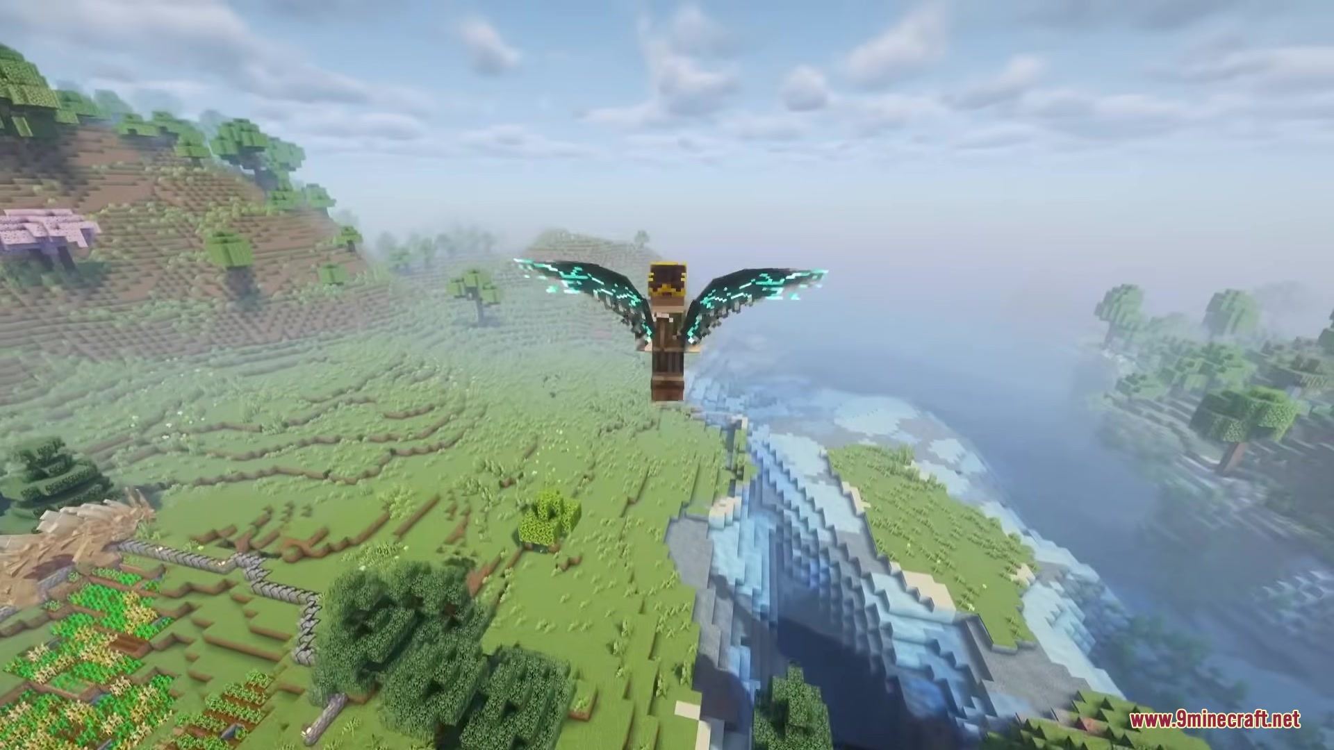 Icarus Re Winged Mod Screenshot 2 Player with custom wings glides through the sky above a vast landscape