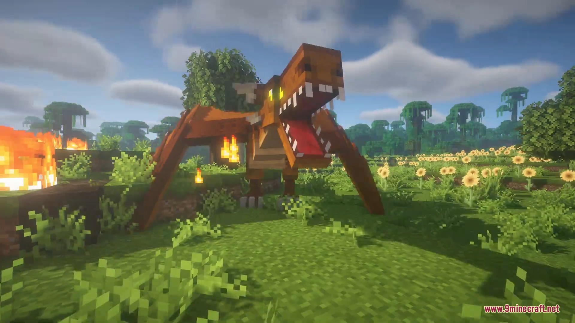 Ice and Fire Dragons 9minecraft Mod Screenshot 9 A large orange fire dragon stands in a grassy field with sunflowers