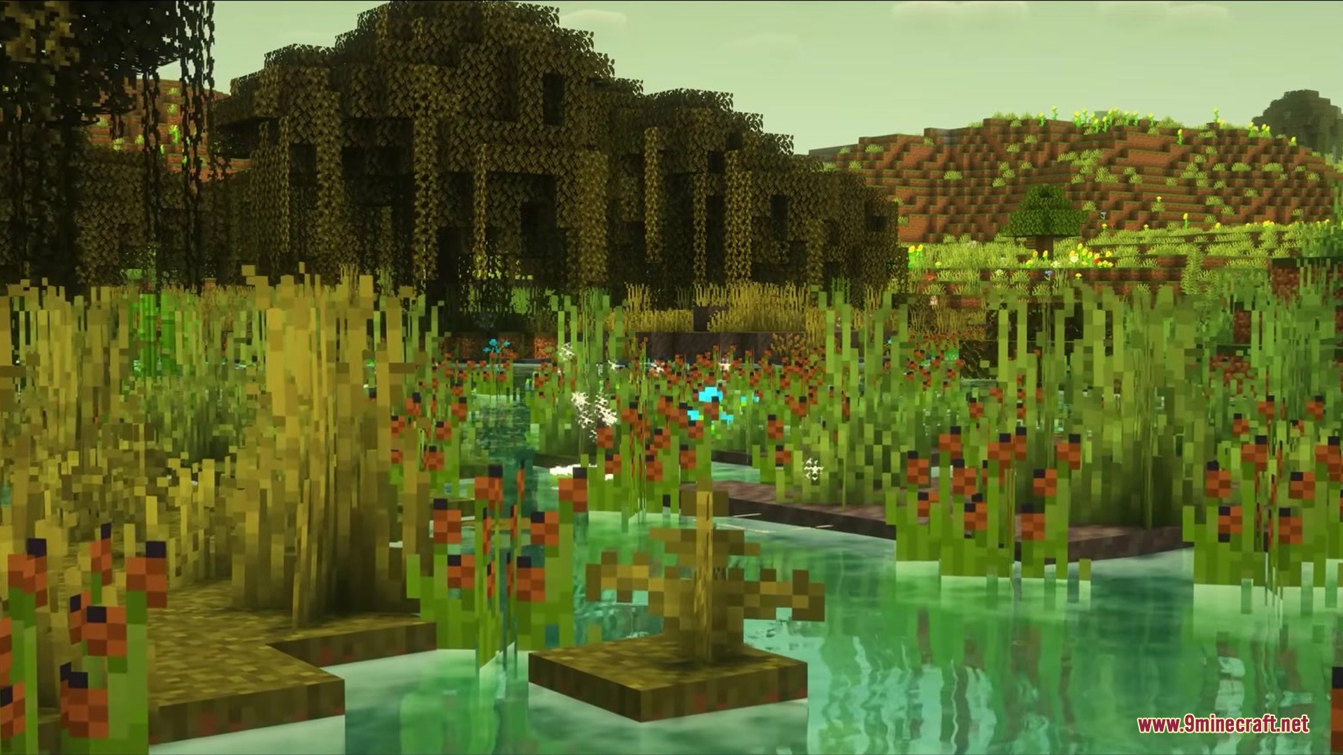 Impillagers Mod Screenshot 2 Dense swamp reeds and colorful flowers growing along the edge of the water
