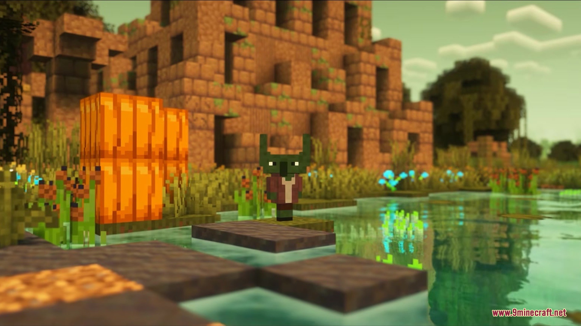 Impillagers Mod Screenshot 4 A small green Impillager mob stands near a swamp with mud brick buildings