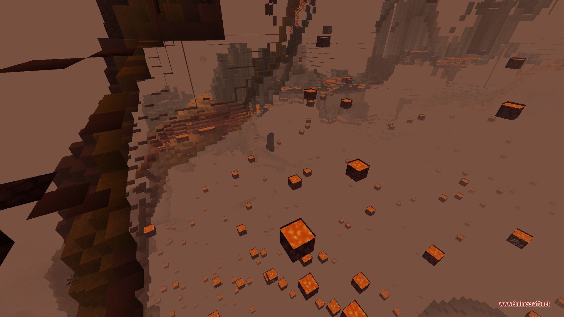 Incendium Legacy Data Pack Screenshot 1 A wide view of a foggy Nether biome with floating lava blocks