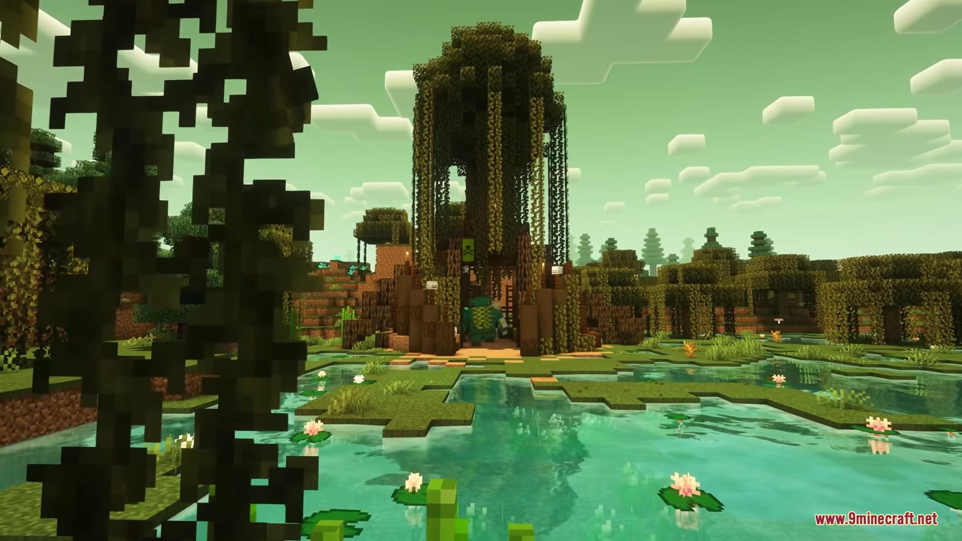 Inhabitants Mod Screenshot 7 A green Bogre stands near a tall structure in a mangrove swamp