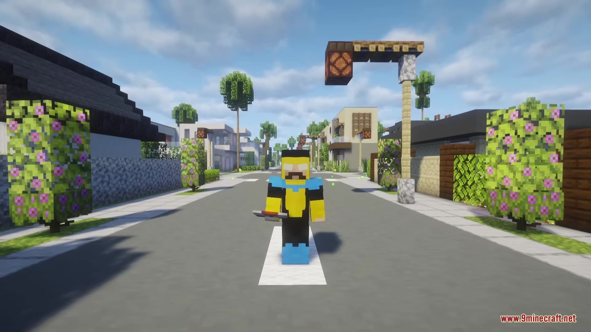 Invincible Incorporated Mod Screenshot 1 A Minecraft player wearing an Omni Man skin stands on a modern street
