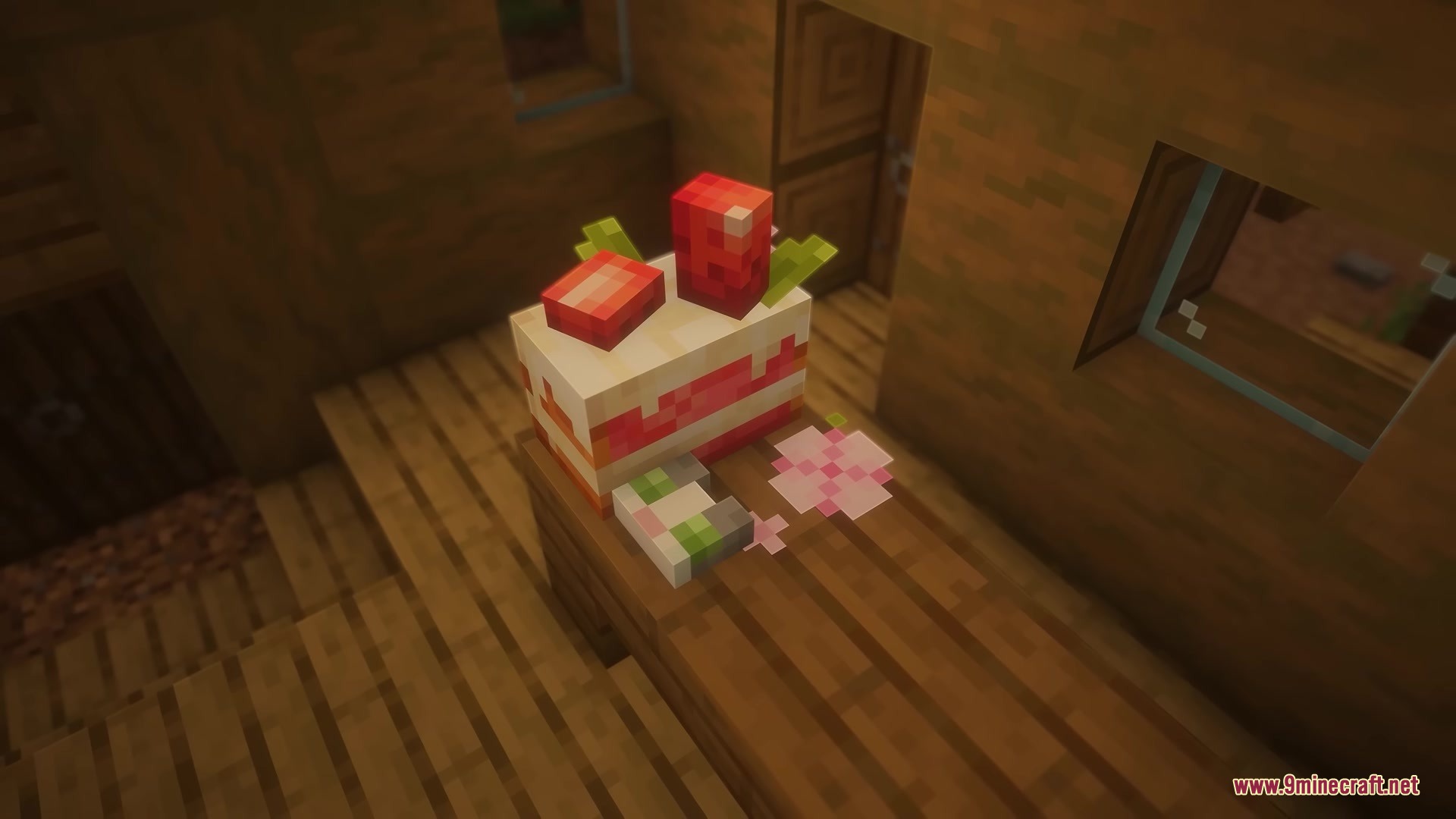 Jellie Cake Resource Pack Screenshot 4 A strawberry cake sits on a wooden table inside a cozy house
