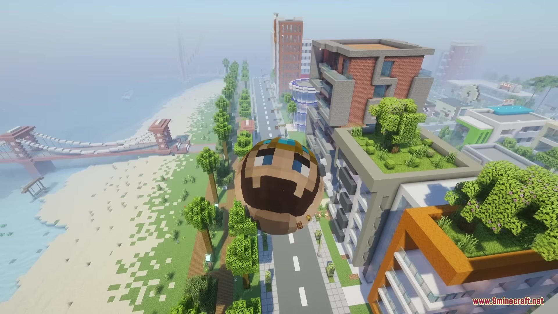Katamari Mod Screenshot 15 A giant sphere with a player face rolling through a modern city street