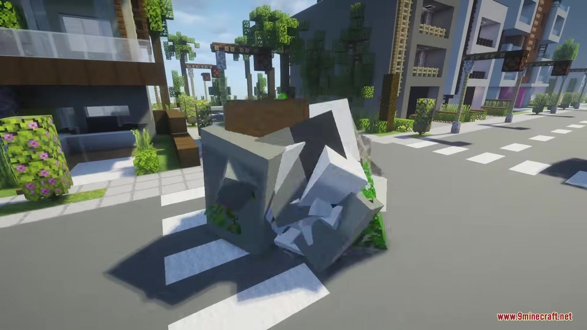 Katamari Mod Screenshot 9 A giant ball of blocks rolls across a crosswalk in a modern city