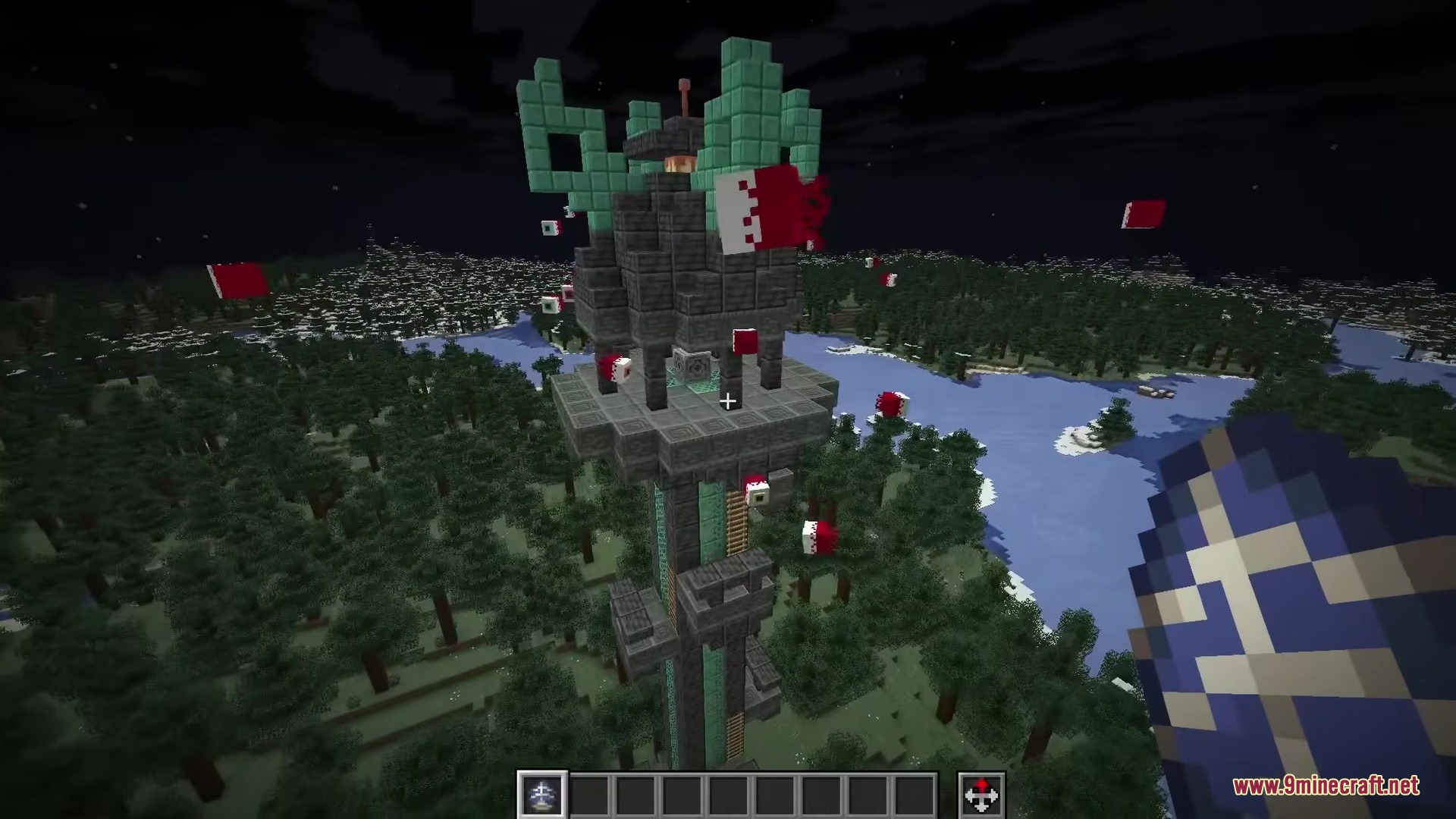 Floating red and white blocks surround a tall stone tower in the forest
