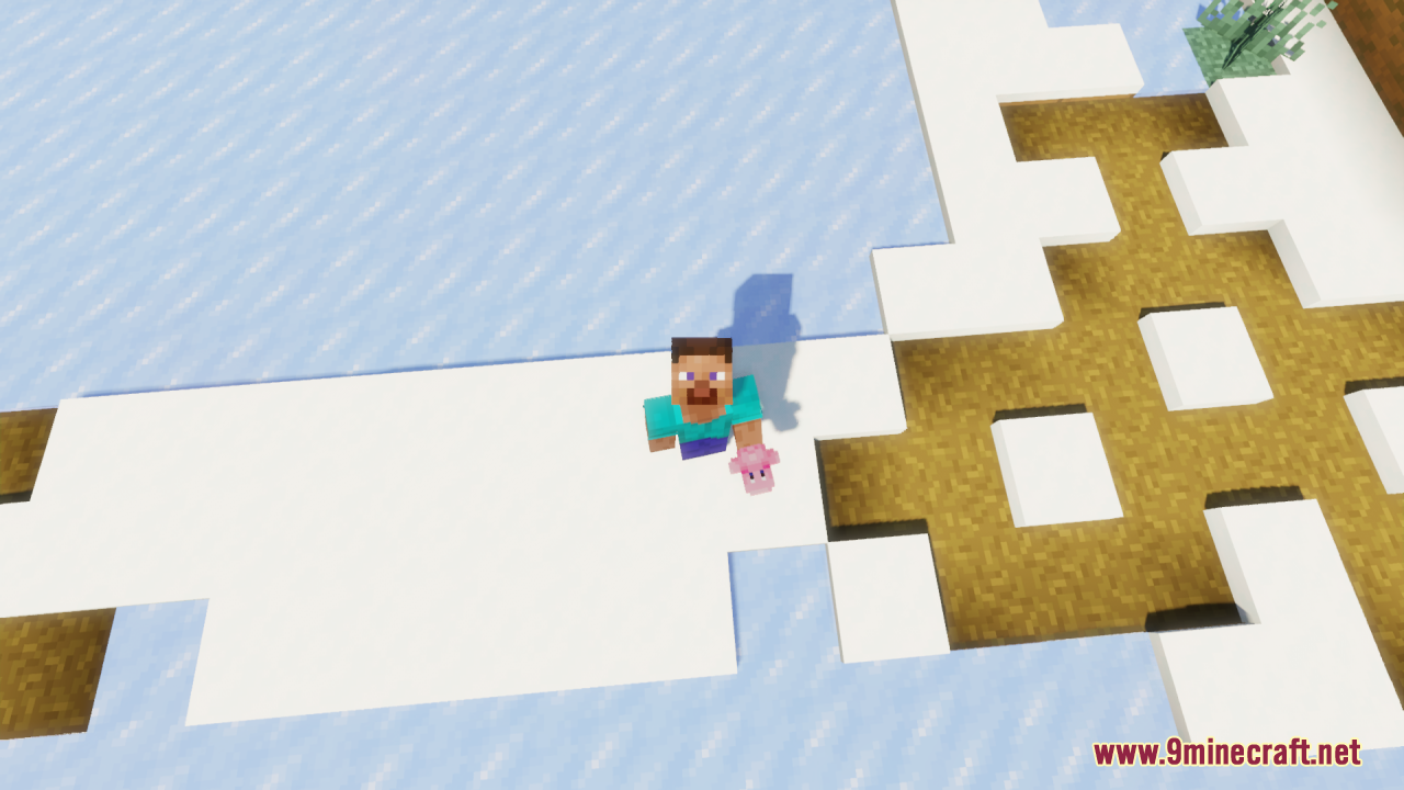 Top down view of Steve holding a small pink Kirby figure on snow