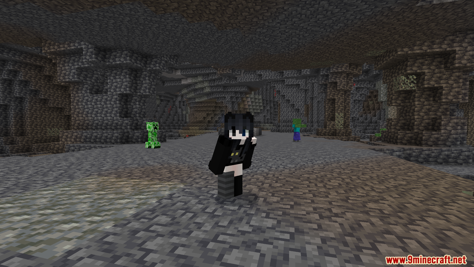 A player explores a bright cave filled with mobs using the night vision effect