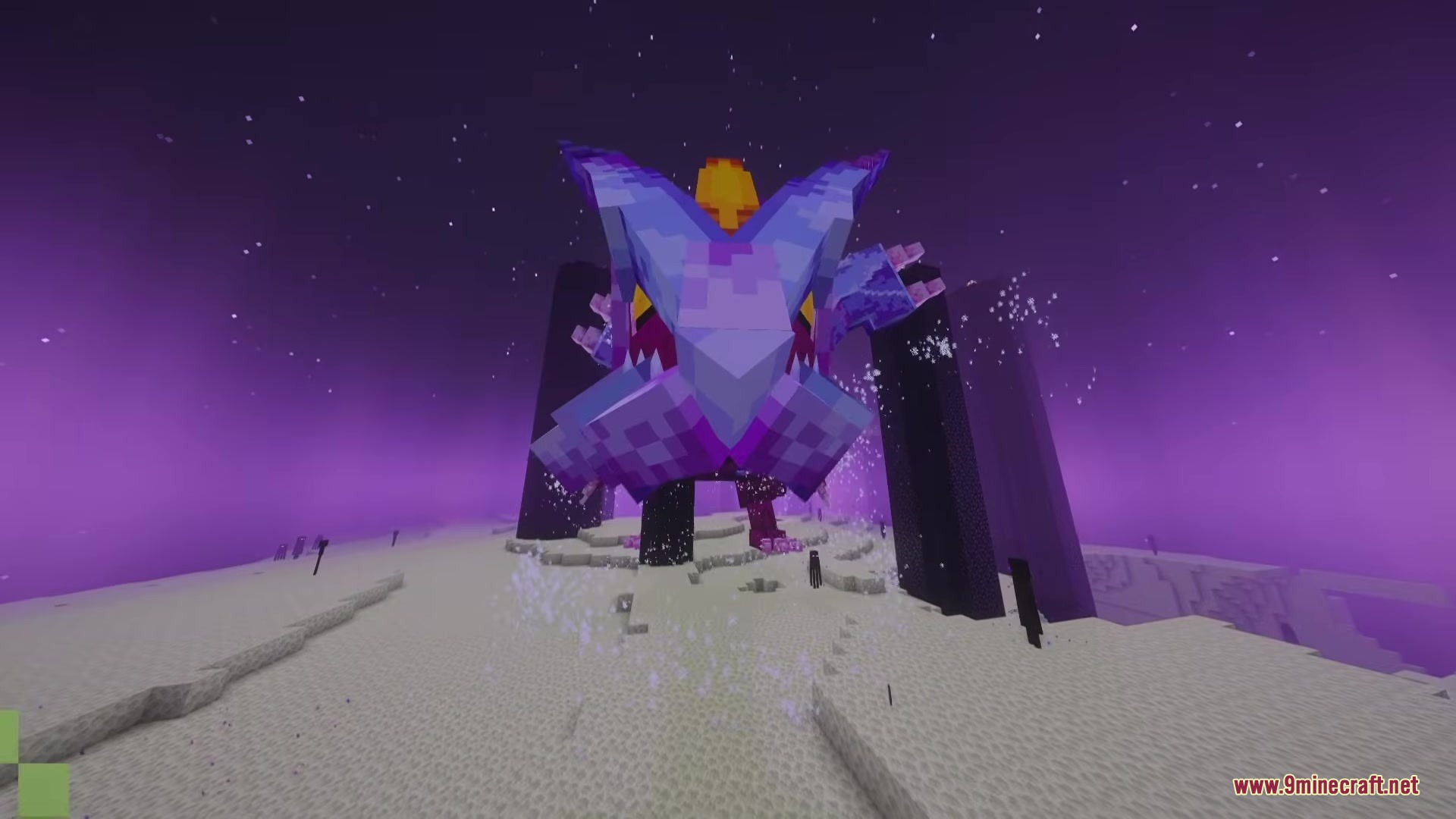 Kyurem Boss Mod Screenshot 6 A giant blue Kyurem boss stands near obsidian pillars in the End