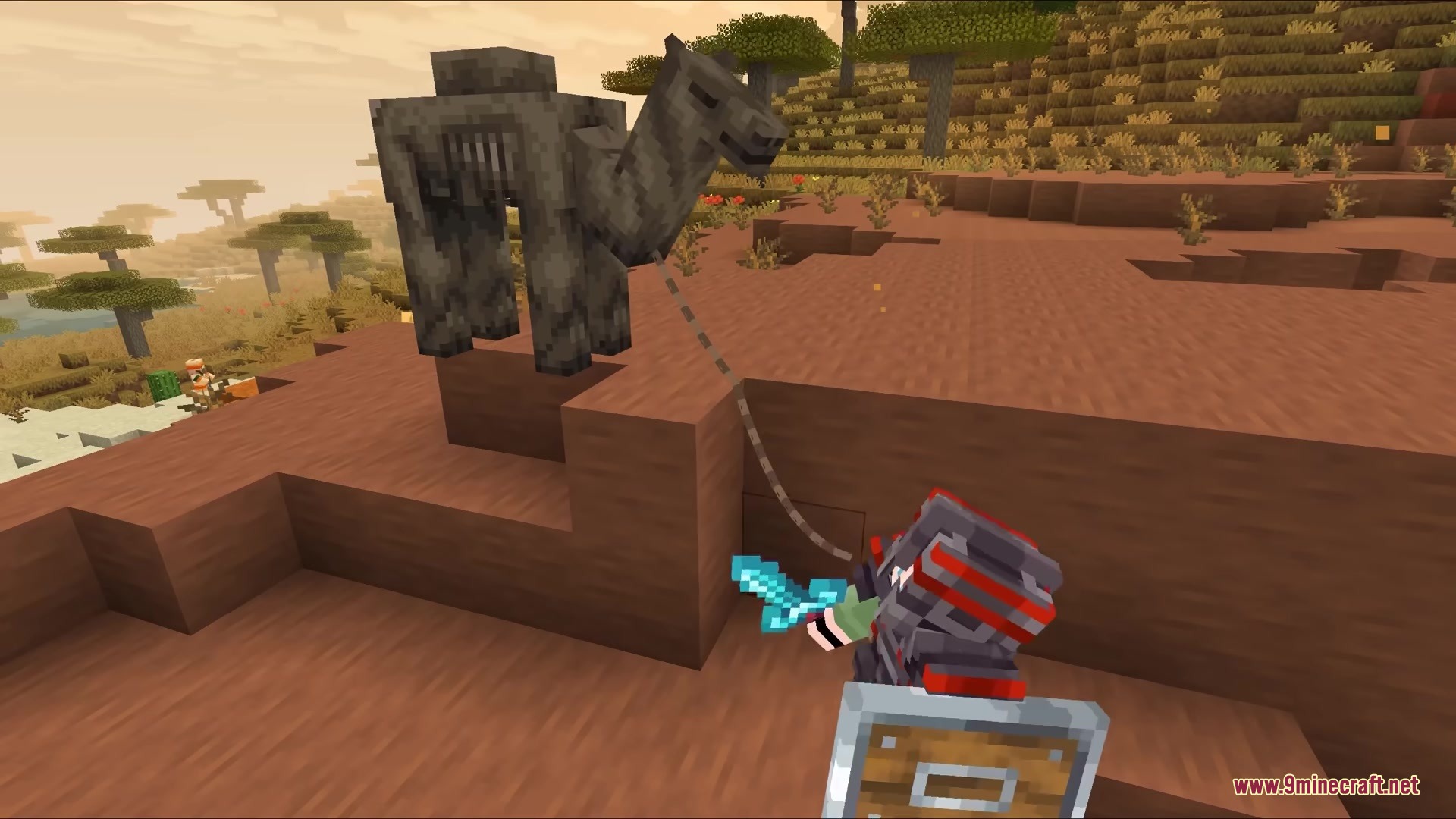 Lead Physics Mod Screenshot 1 A player in armor holds a realistic rope lead attached to a skeletal camel