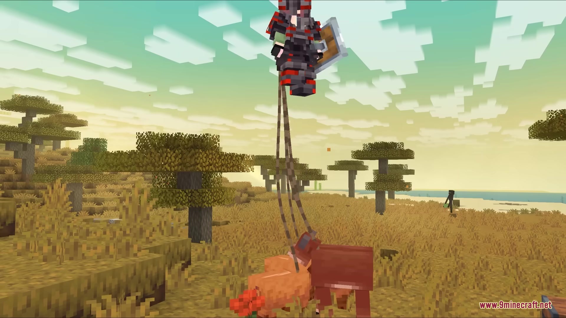 Lead Physics Mod Screenshot 2 A player floats in the sky with multiple rope leads attached to animals