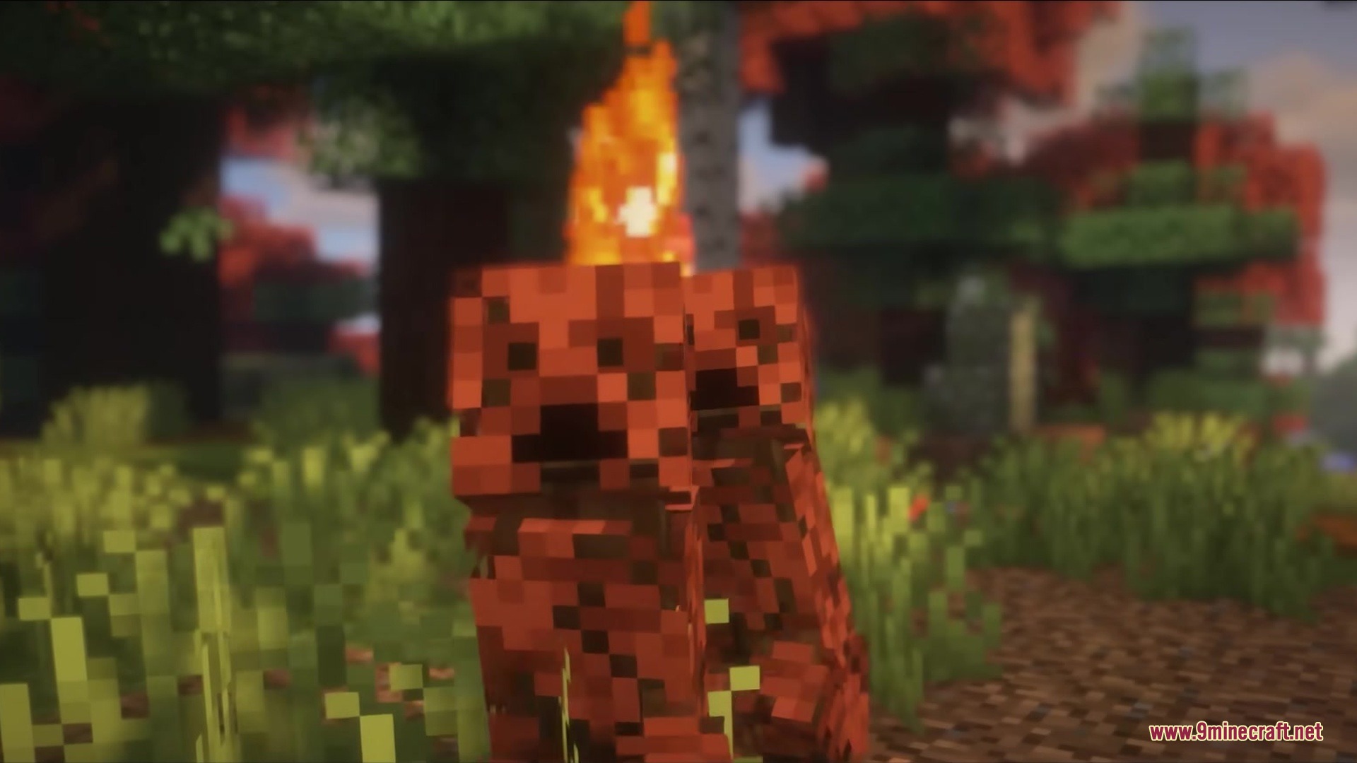 Leafy Creepers Resource Pack Screenshot 8 Close up of a red leafy creeper with a fire burning behind