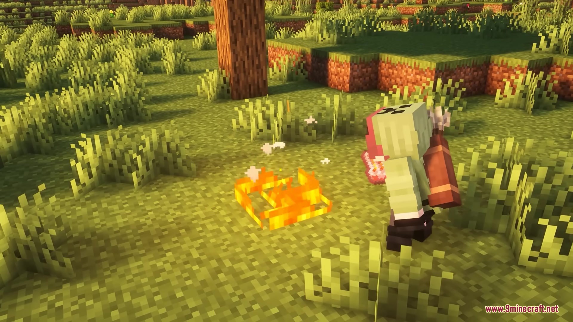 Legionary Mod Screenshot 10 Player using the thermal stone item to light a fire on the grass