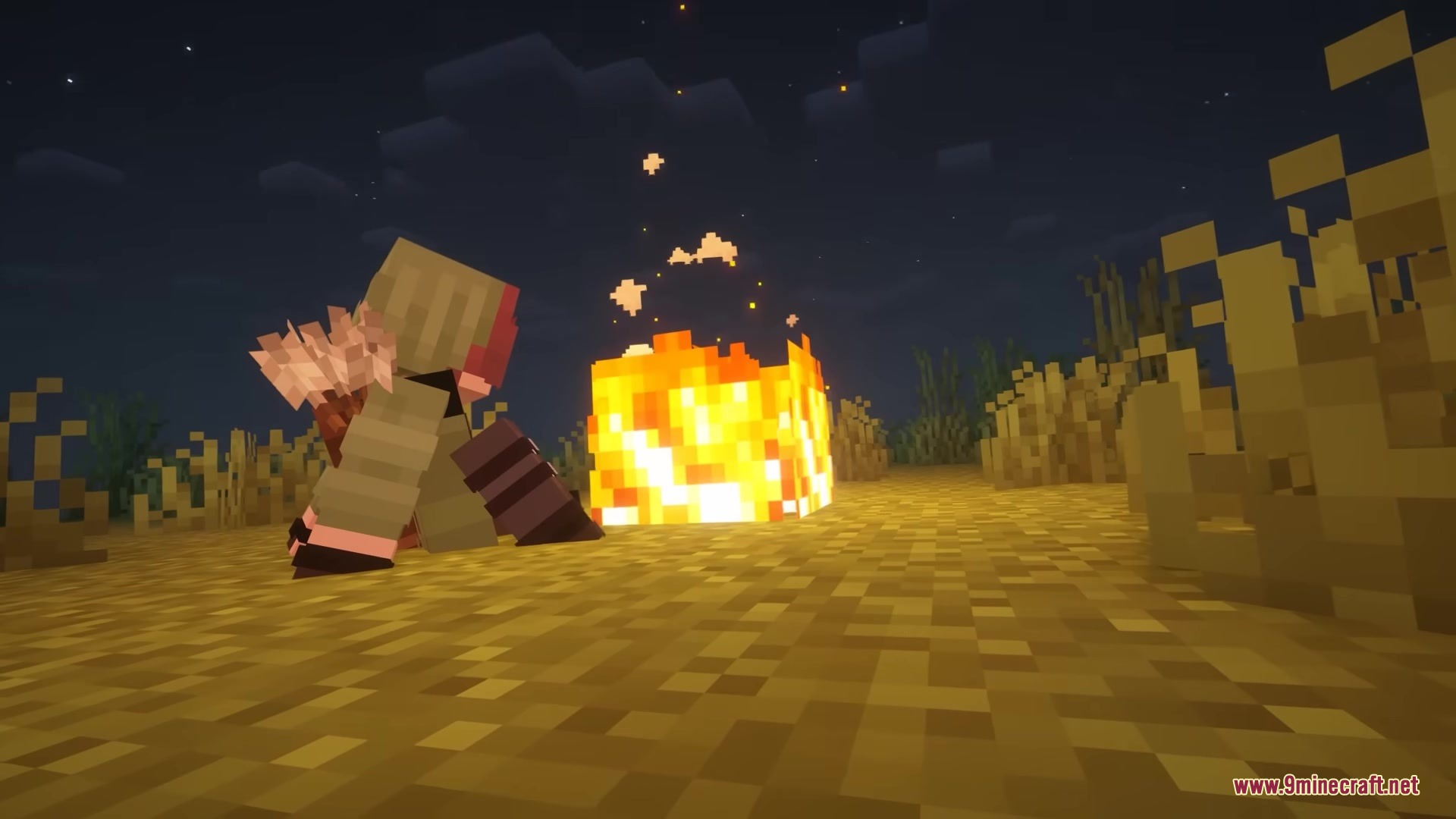 Legionary Mod Screenshot 11 A player sitting next to a campfire in a dark grassy field