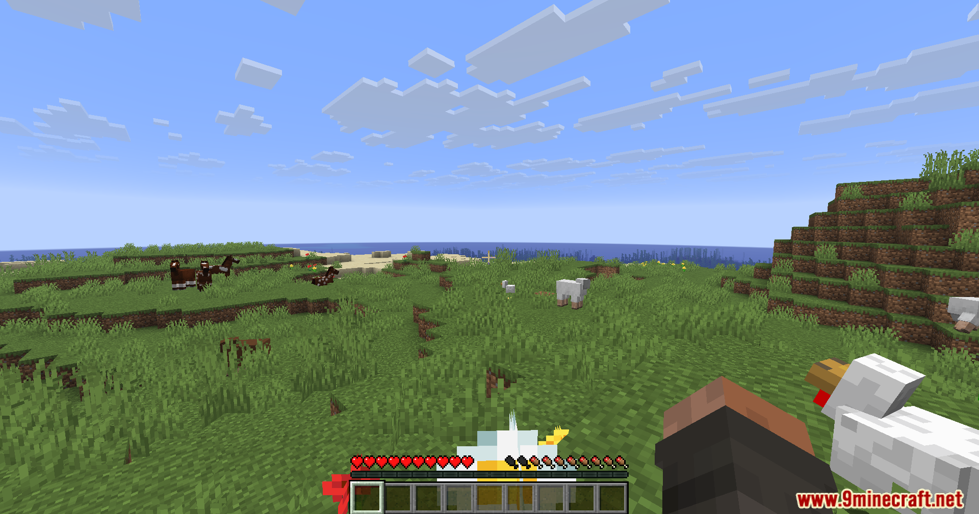 Lightning Grim Anticheat Mod Screenshot 11 Player holding a chicken in a grassy field with horses and sheep