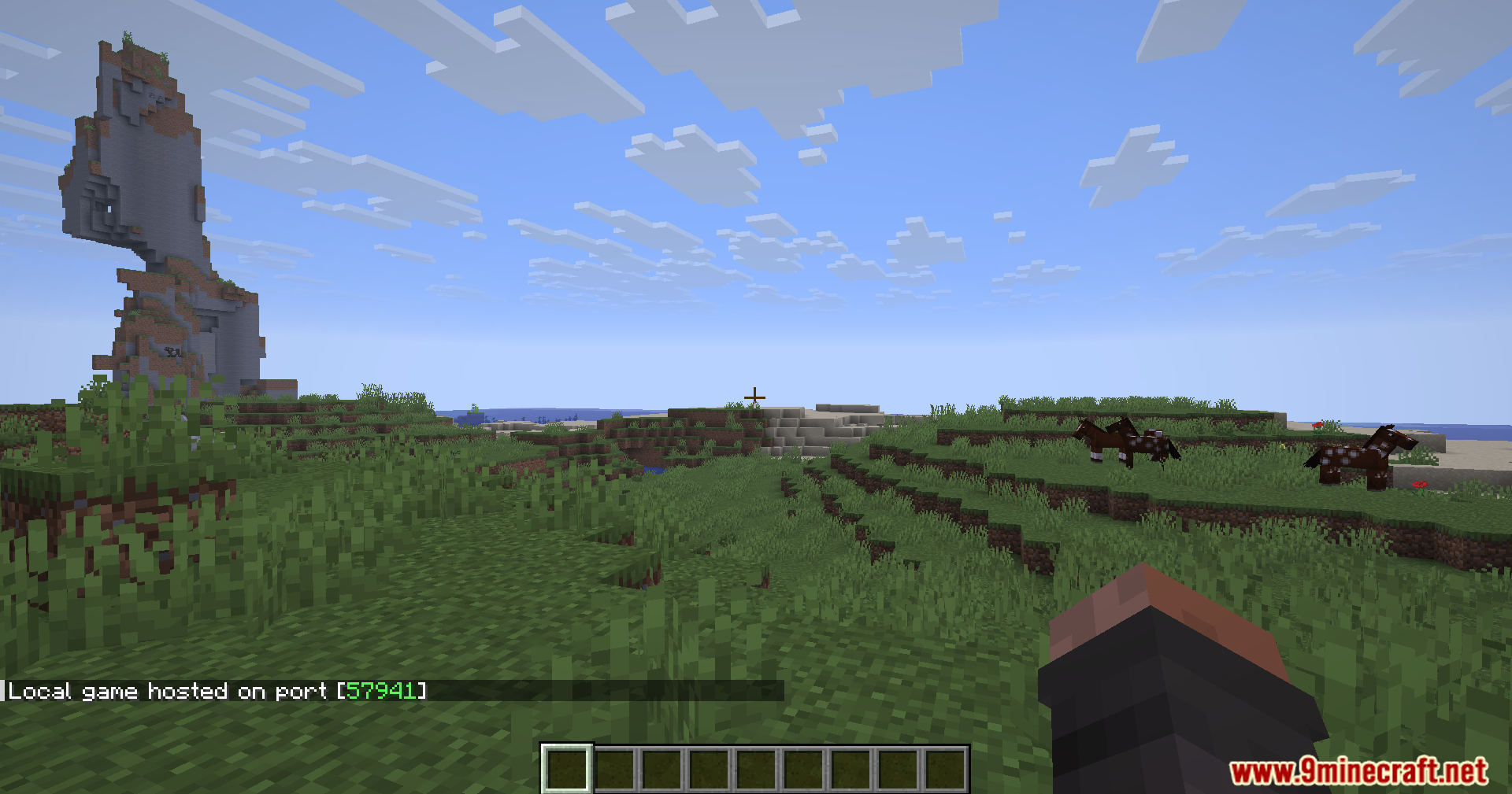 Lightning Grim Anticheat Mod Screenshot 2 A player explores a grassy plain with horses near a tall rock formation