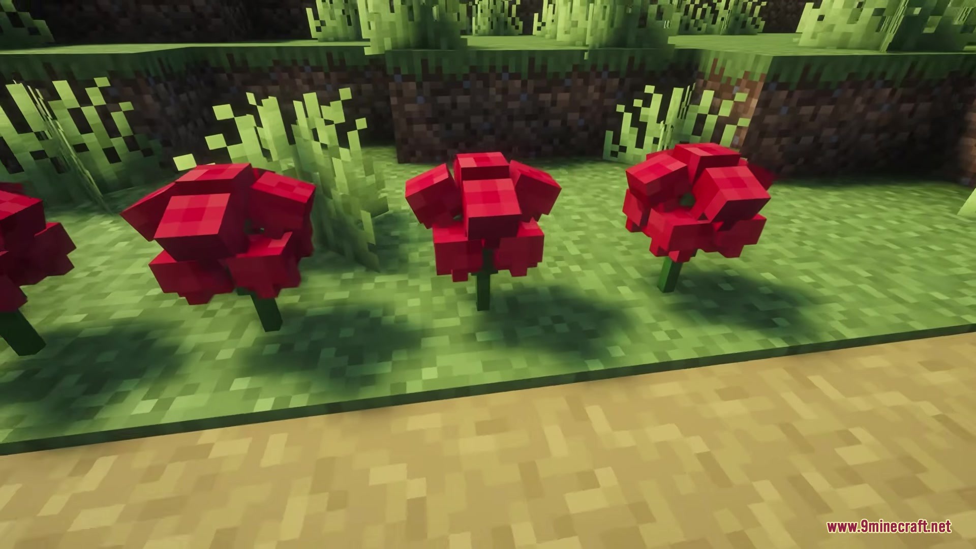 Love Core Mod Screenshot 7 Three red blocky roses planted in the green grass