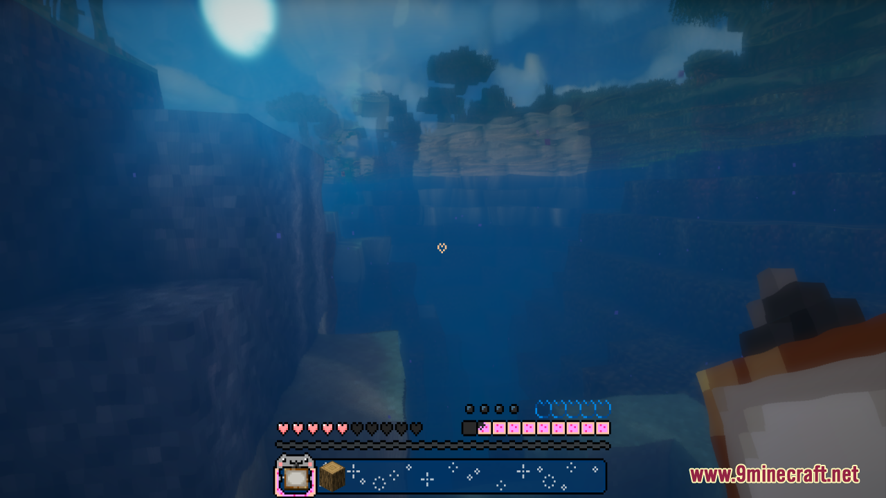 Underwater view of a deep ravine featuring a colorful rainbow themed hotbar