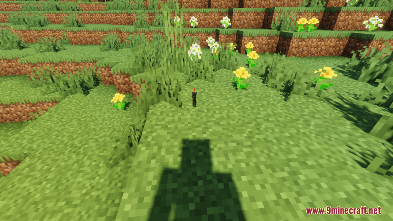 Lz Rustic Torch Resource Pack Screenshot 4 A custom rustic torch placed on the ground near bright yellow flowers