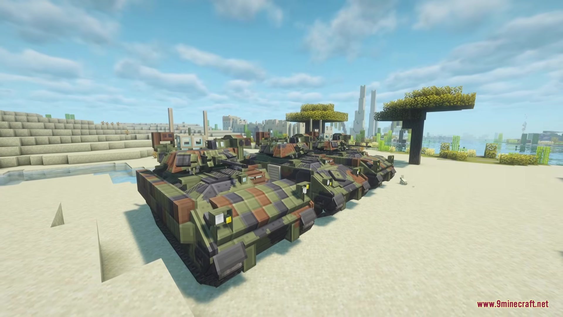 MCSP Military Vehicle Pack Mod Screenshot 7 Three camouflaged military vehicles parked on a sandy beach in Minecraft world