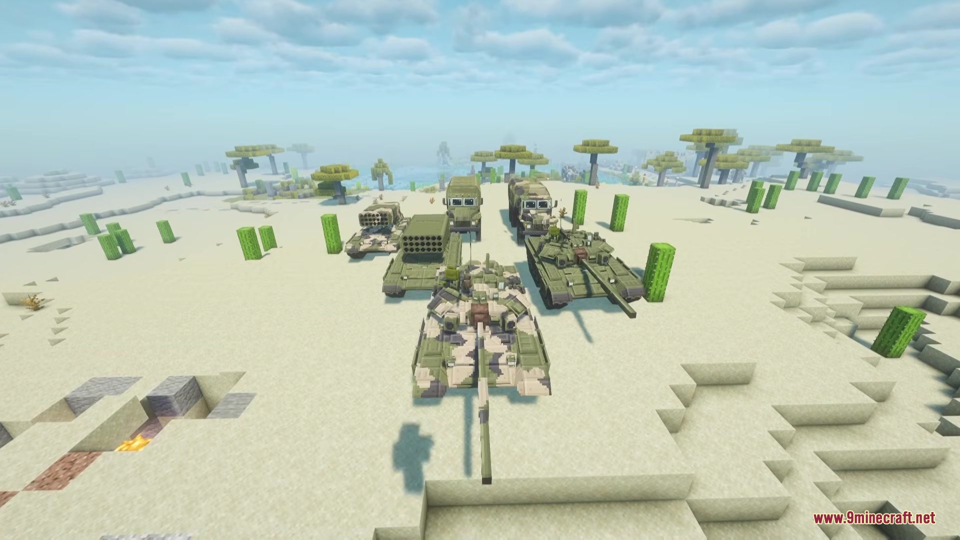 MCSP Military Vehicle Pack Mod Screenshot 9 A collection of military tanks and trucks parked in a desert biome