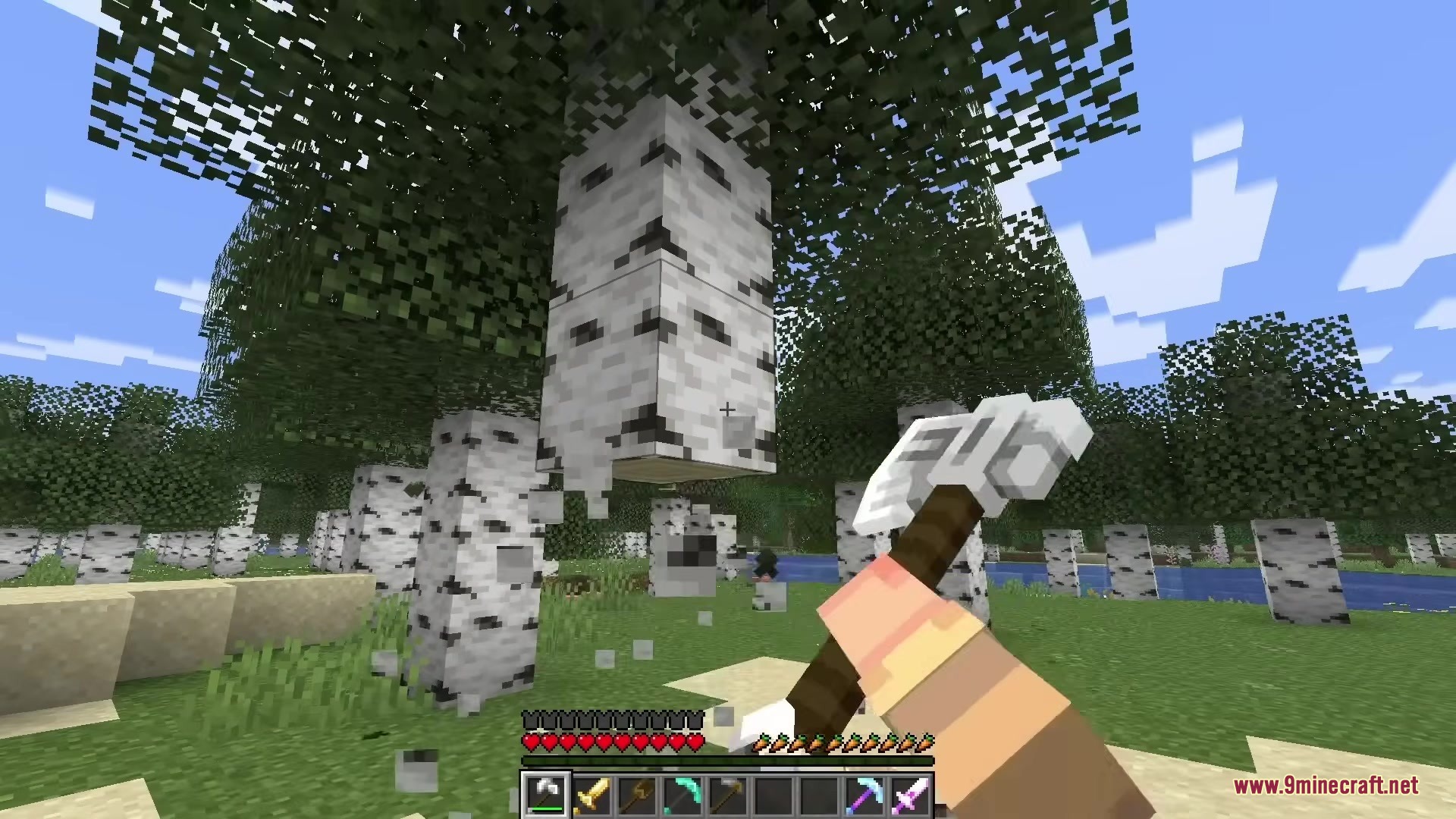 Player chopping a birch tree with a detailed 3D white axe in hand