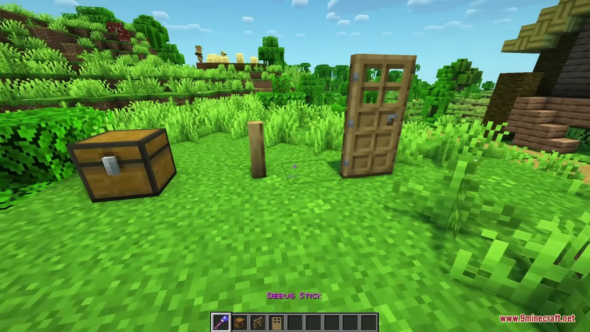A player holds the wand from the Magical Debug Stick Resource Pack