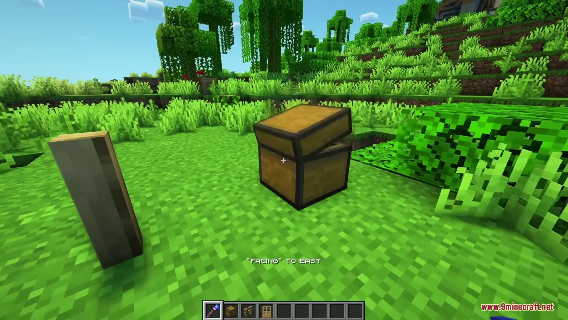The magical debug stick changes the facing direction of a wooden chest