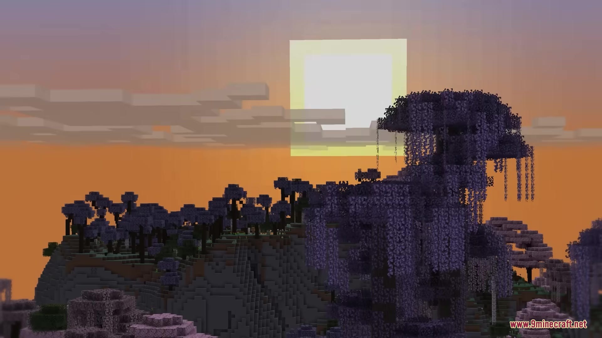 Mc Alive Leaves Resource Pack Screenshot 9 Tall purple trees with hanging vines stand on a hill at sunset