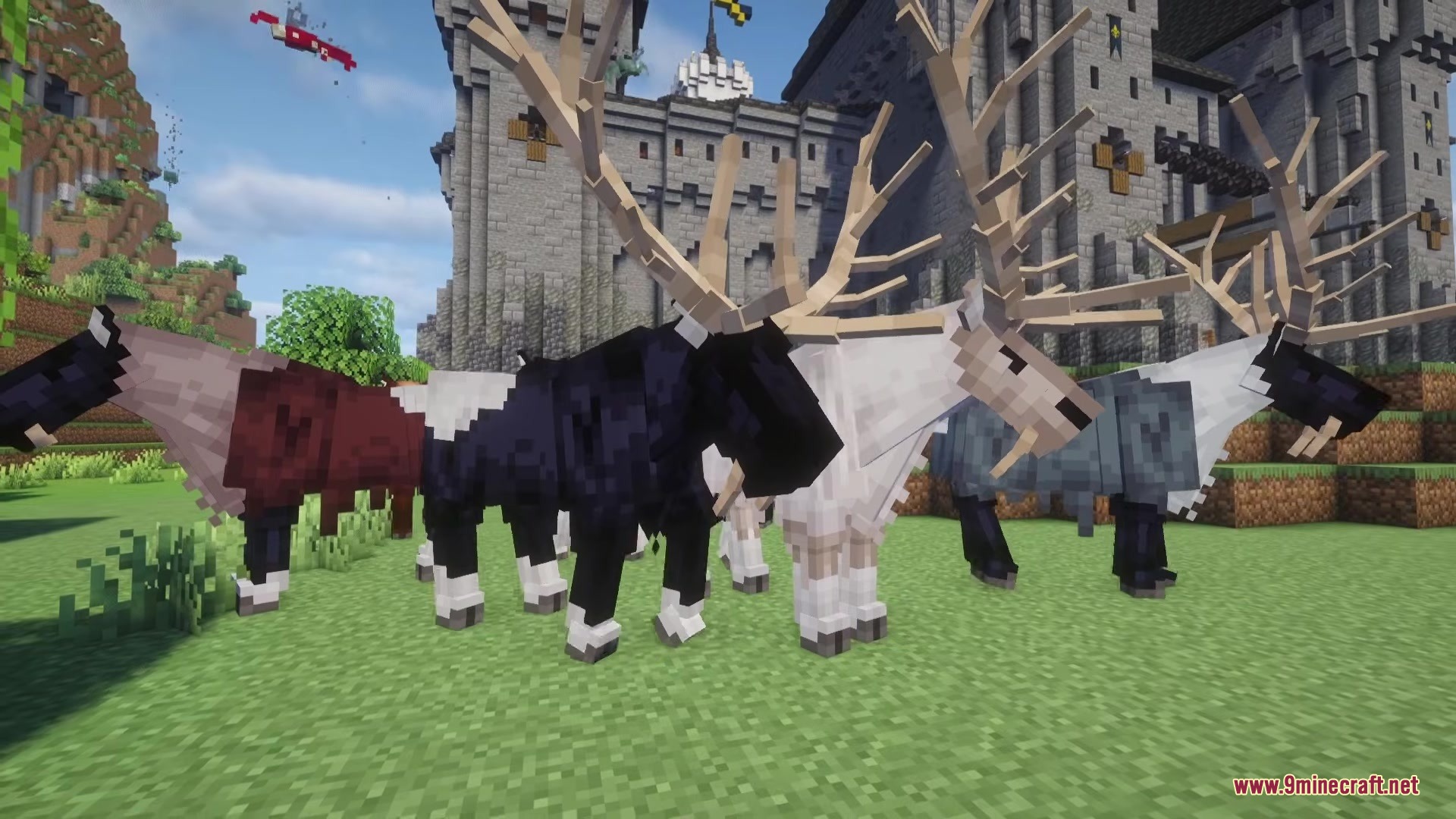 Medieval Embroidery Mod Screenshot 14 A group of colorful fanged elks standing together on a grassy field