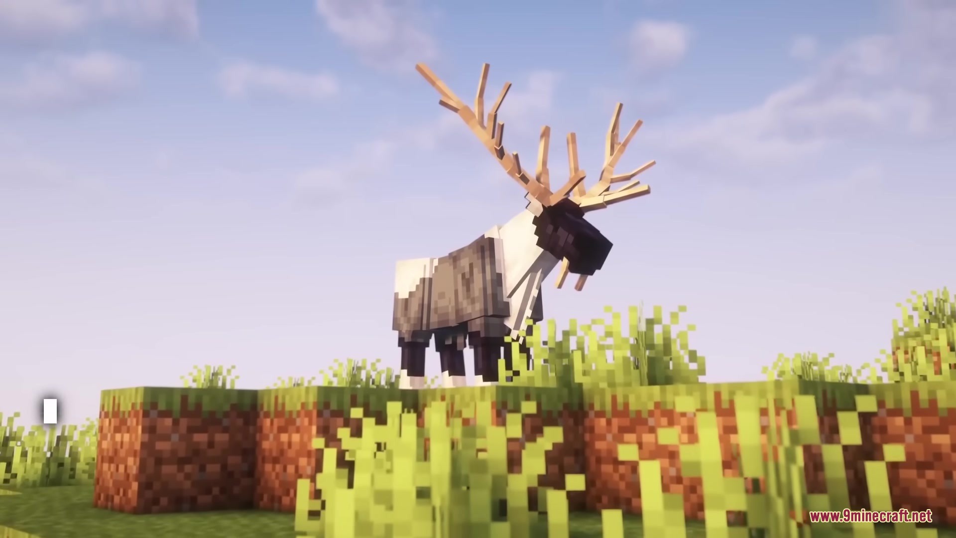 Medieval Embroidery Mod Screenshot 2 A large fanged elk stands on a grassy hill under a clear sky