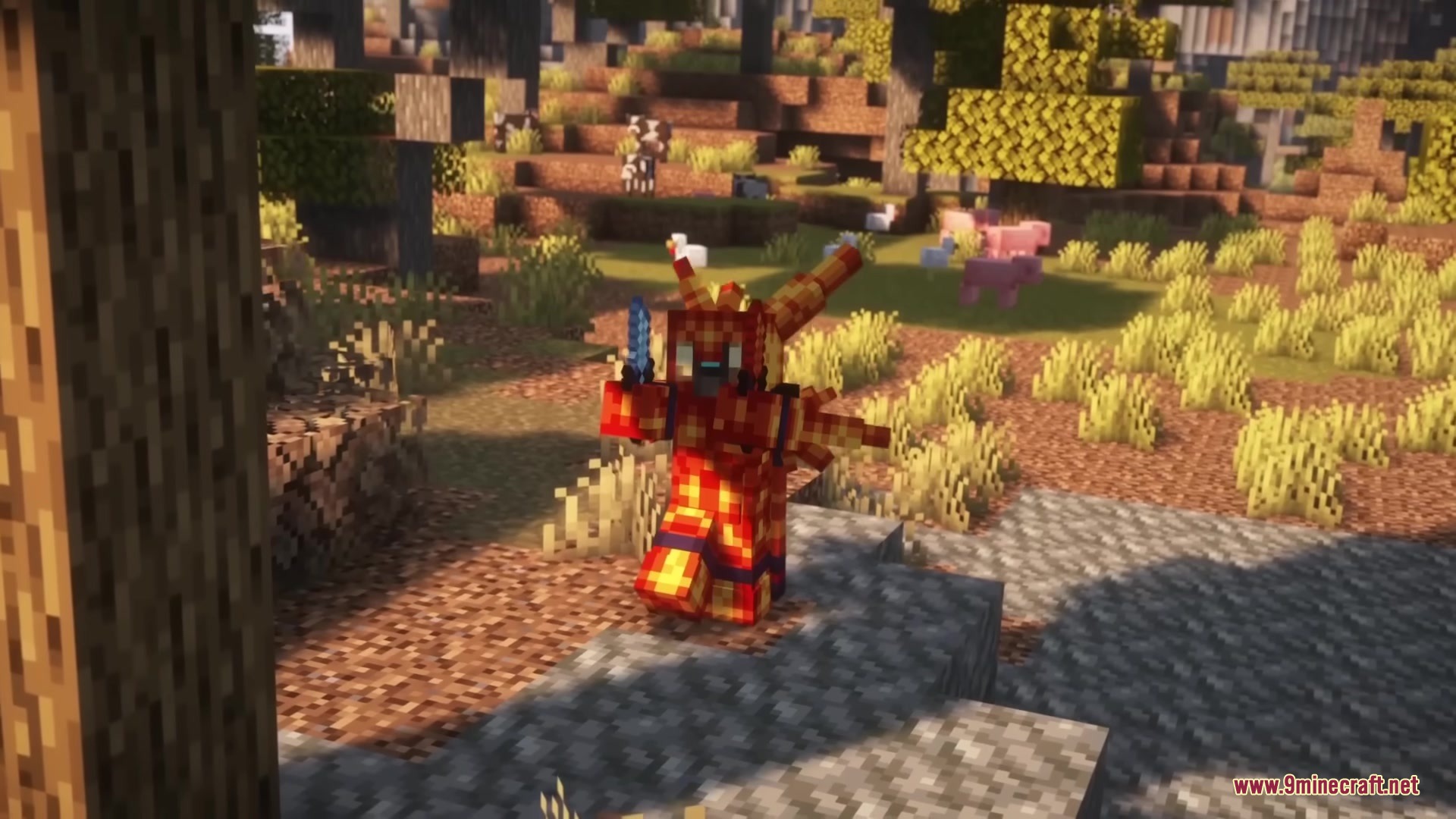 Medieval Embroidery Mod Screenshot 4 A character equipped with fiery gemstone armor stands in a sunlit forest