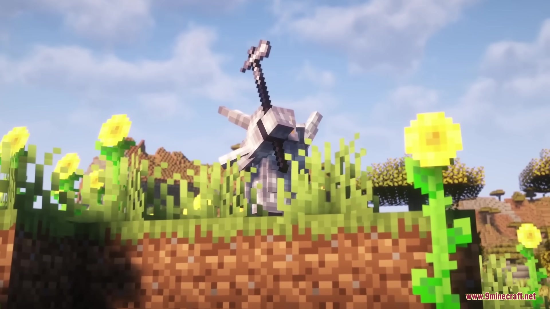 Medieval Embroidery Mod Screenshot 8 A stone creature with a sword head standing among sunflowers in tall grass