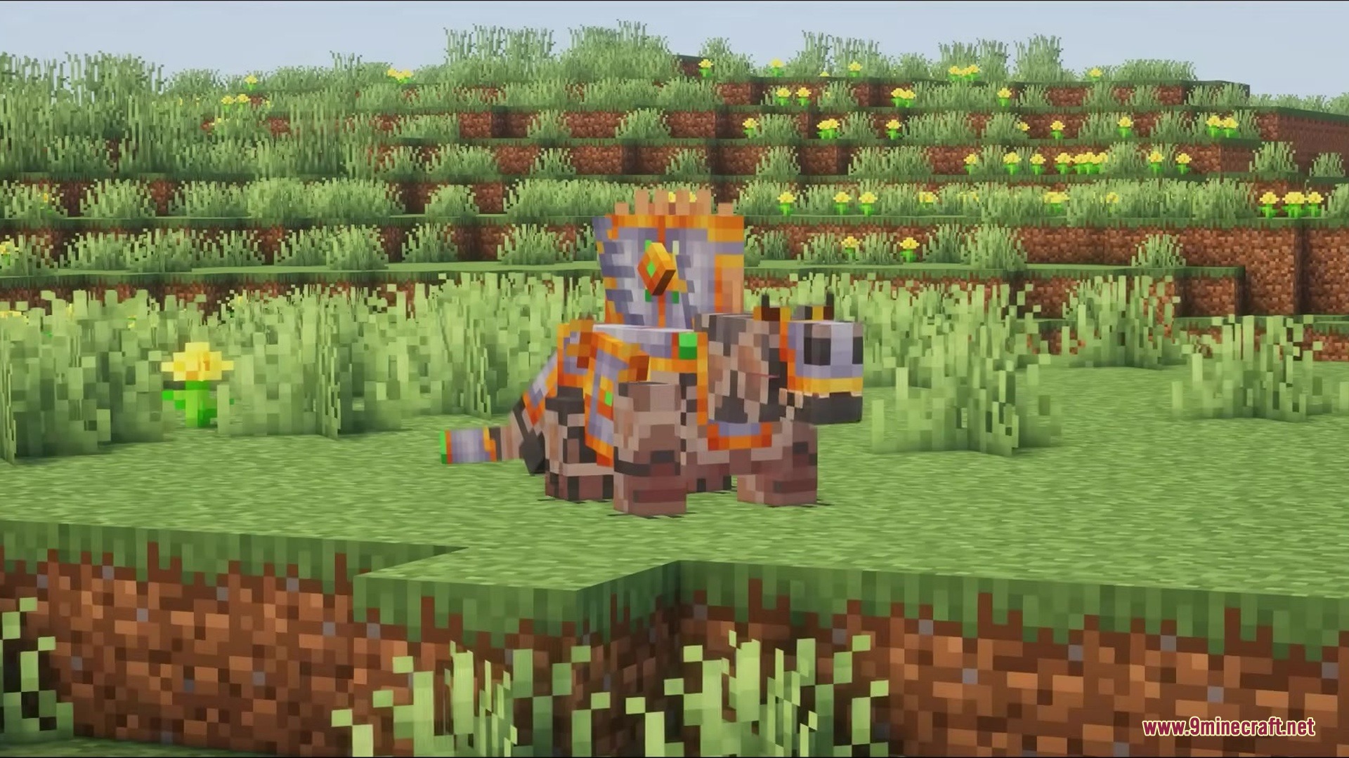A prehistoric Dimetrodon wearing decorative gear stands in a grassy Minecraft field