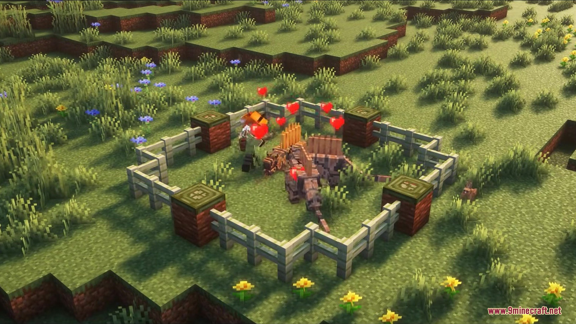 A player breeds two prehistoric Dimetrodons inside a wooden fence enclosure
