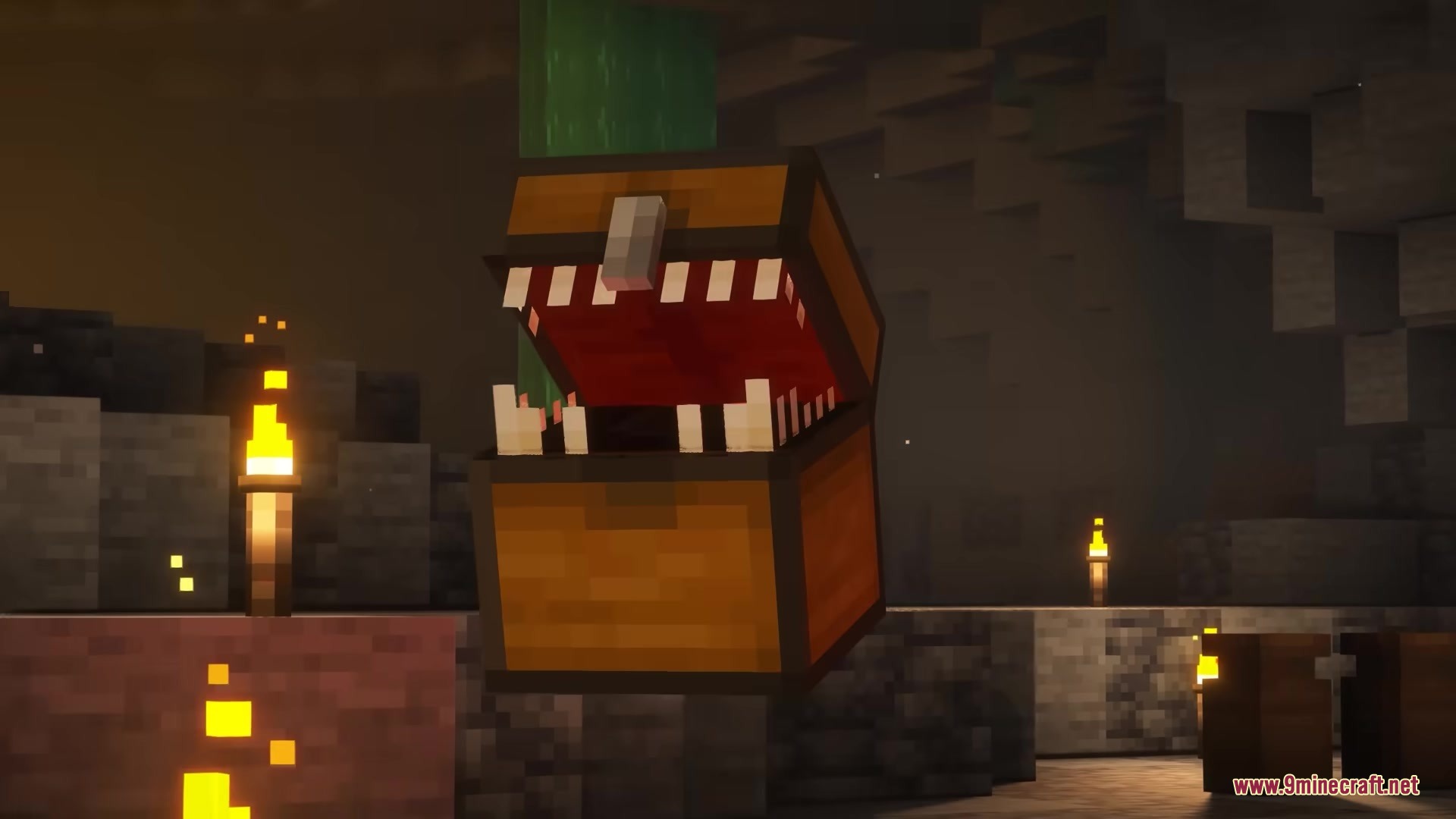 A dangerous mimic chest with sharp teeth inside a dark Minecraft cave