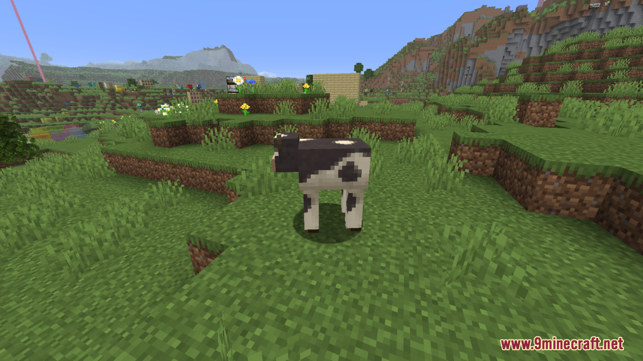 Mizuno's Cow Variants Resource Pack Screenshot 1 A black and white cow variant standing on a grassy hill in Minecraft