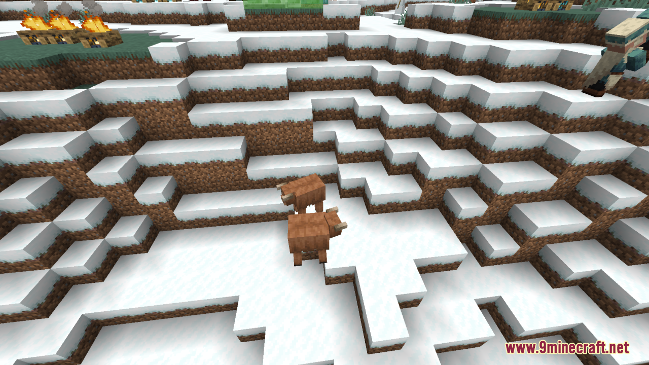 Mizuno's Cow Variants Resource Pack Screenshot 12 Two brown cows with horns standing on a snowy hill in Minecraft