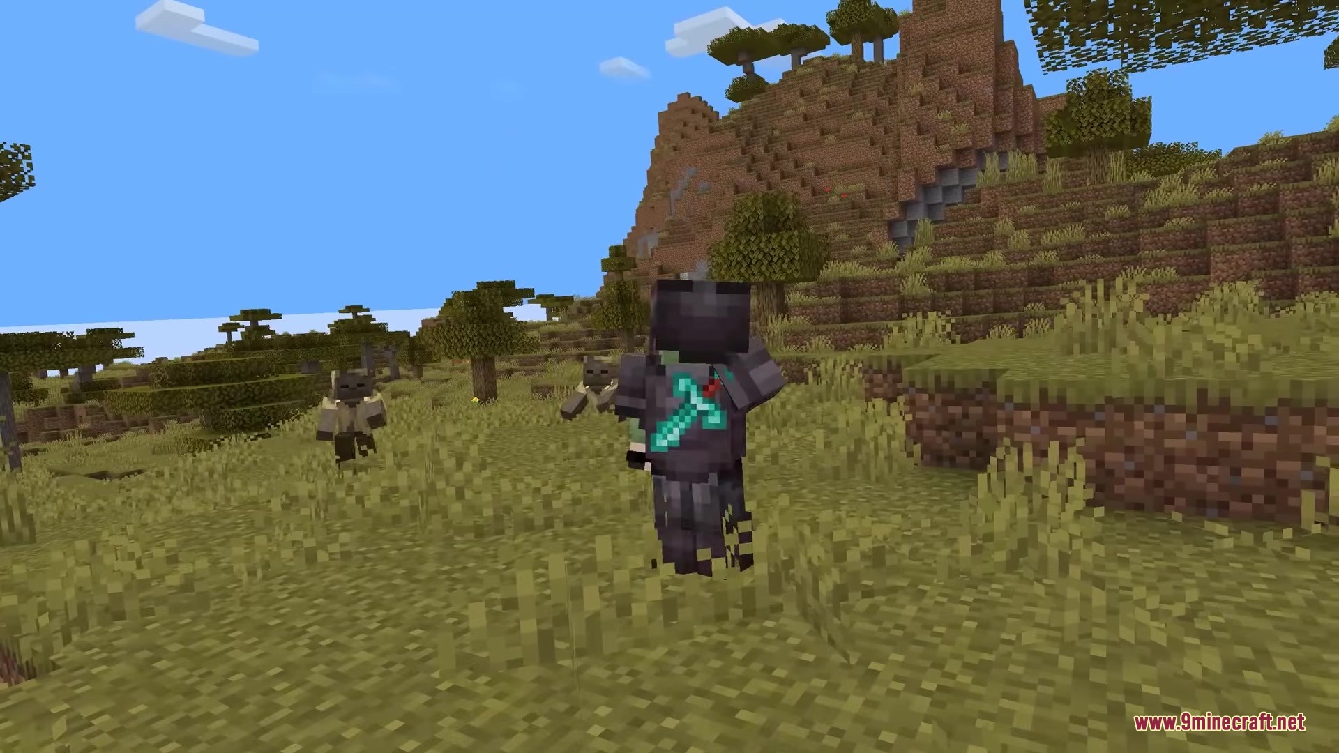 Mob Effects VFX Mod Screenshot 2 Dark magic shapes swirling around a player character in a savanna landscape