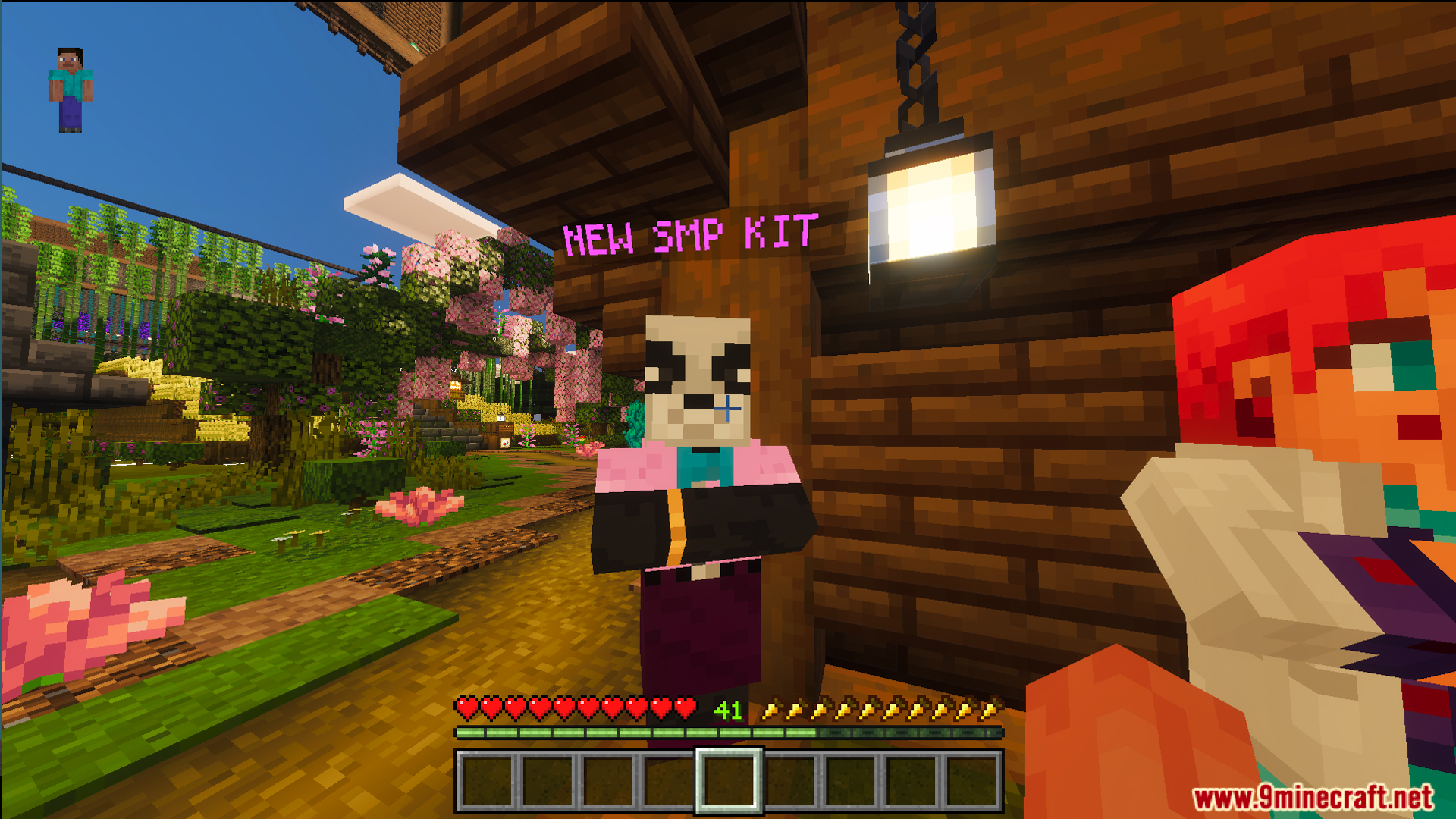 Player character standing next to a bot to select one of twenty kits