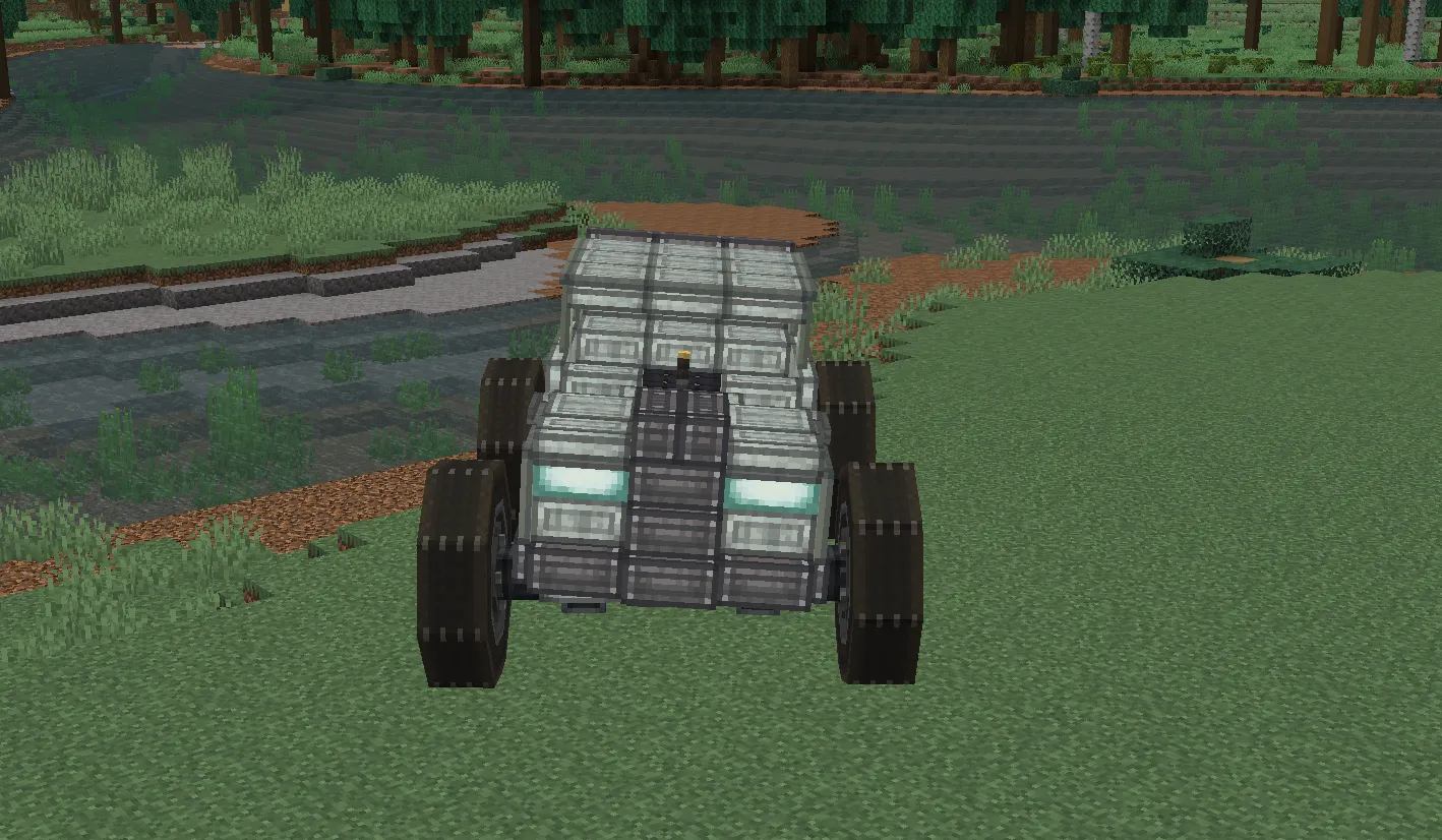 Monster Truck with Suspention Schematic Screenshots 2 Front view of a grey monster truck with glowing headlights on a field