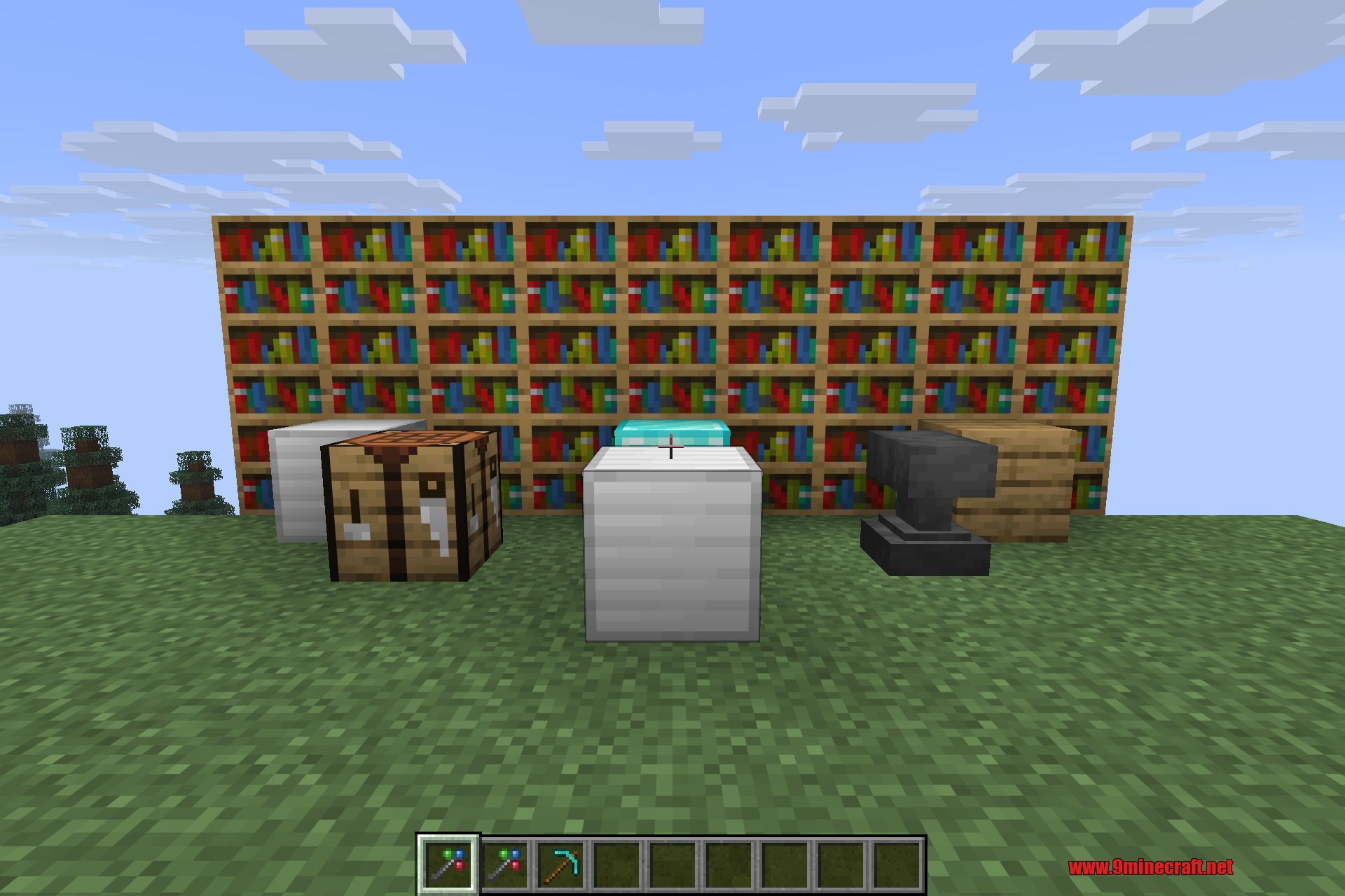 Morph-o-Tool 9minecraft Mod Screenshot 5 Morpho Tool resting on an iron block with bookshelves and a crafting table