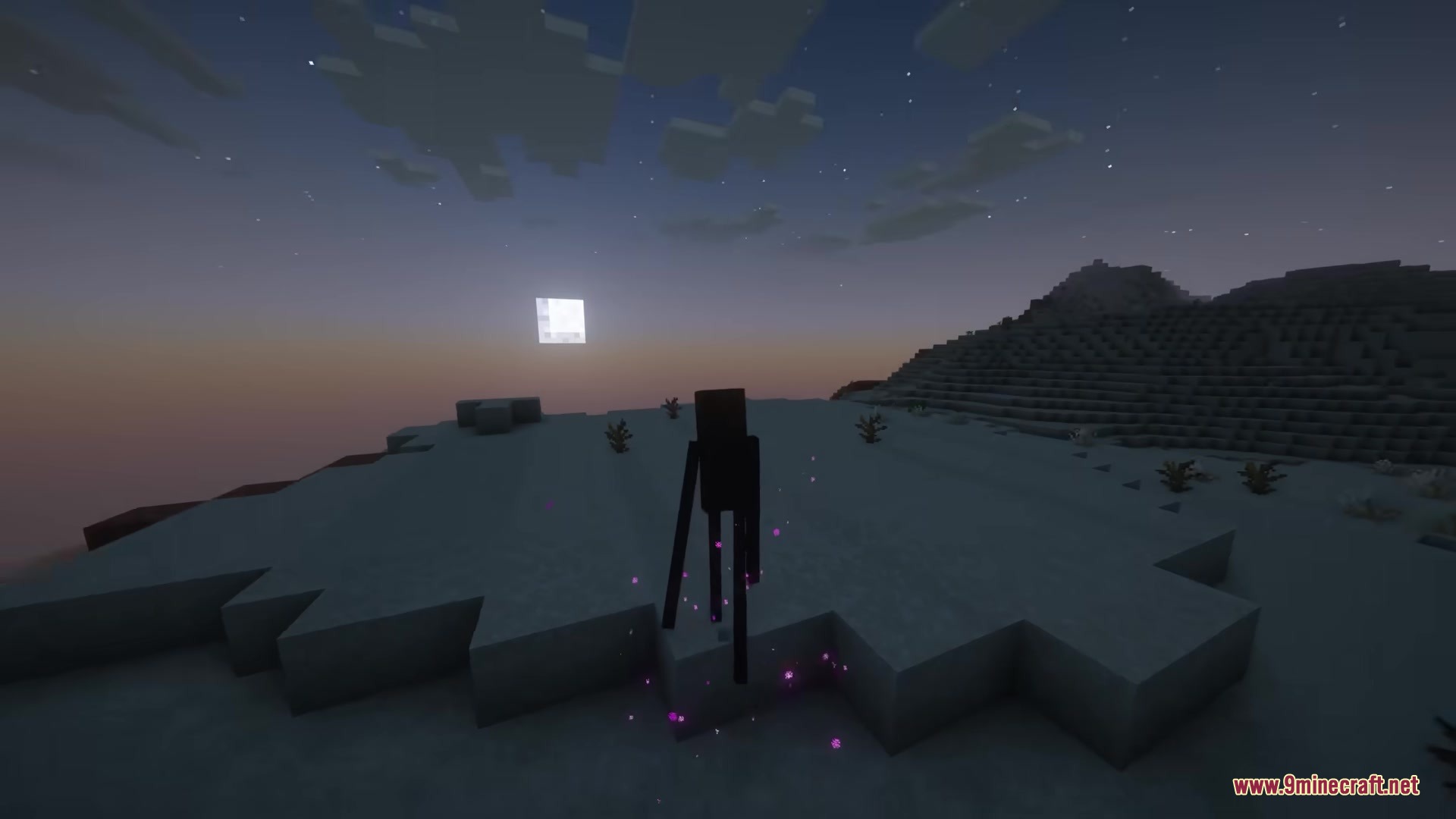Morphling Mod Screenshot 2 An Enderman stands in a desert at night with glowing purple particles