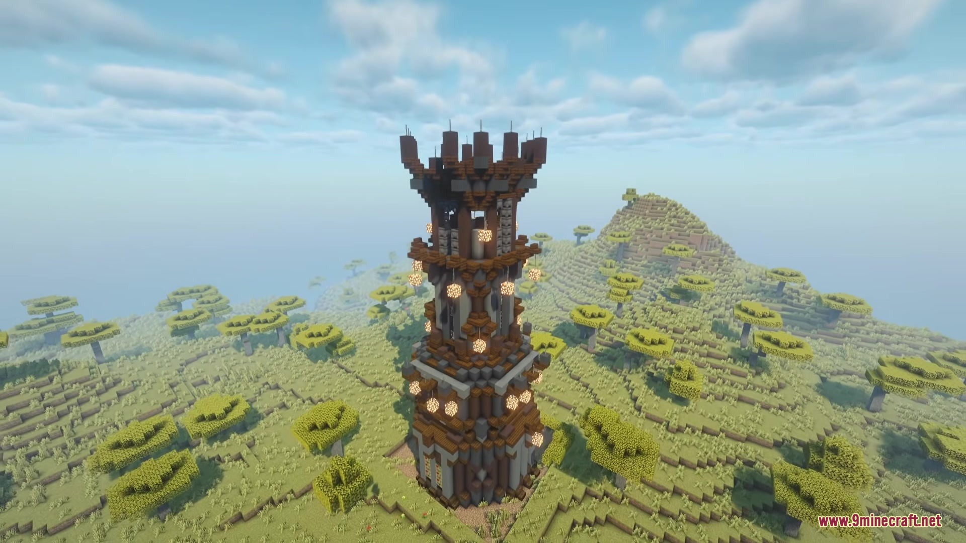 A tall tower from Much More Dungeons Mod standing in a savanna